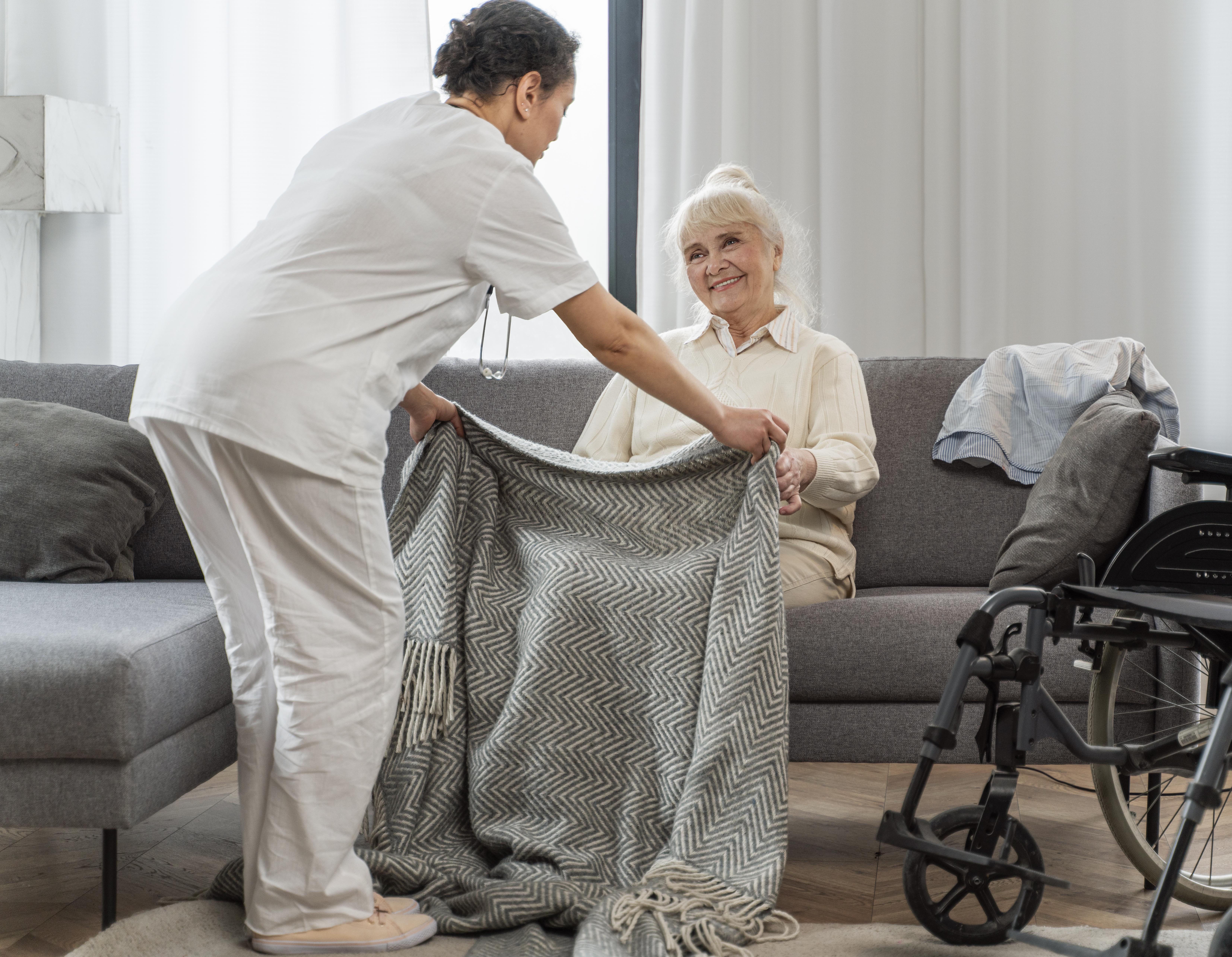 Professional caregiver providing personal care assistance